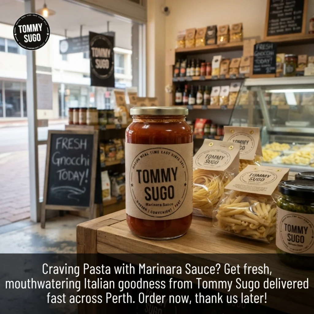 Fresh Pasta with Marinara Sauce and Italian ingredients on a wooden table